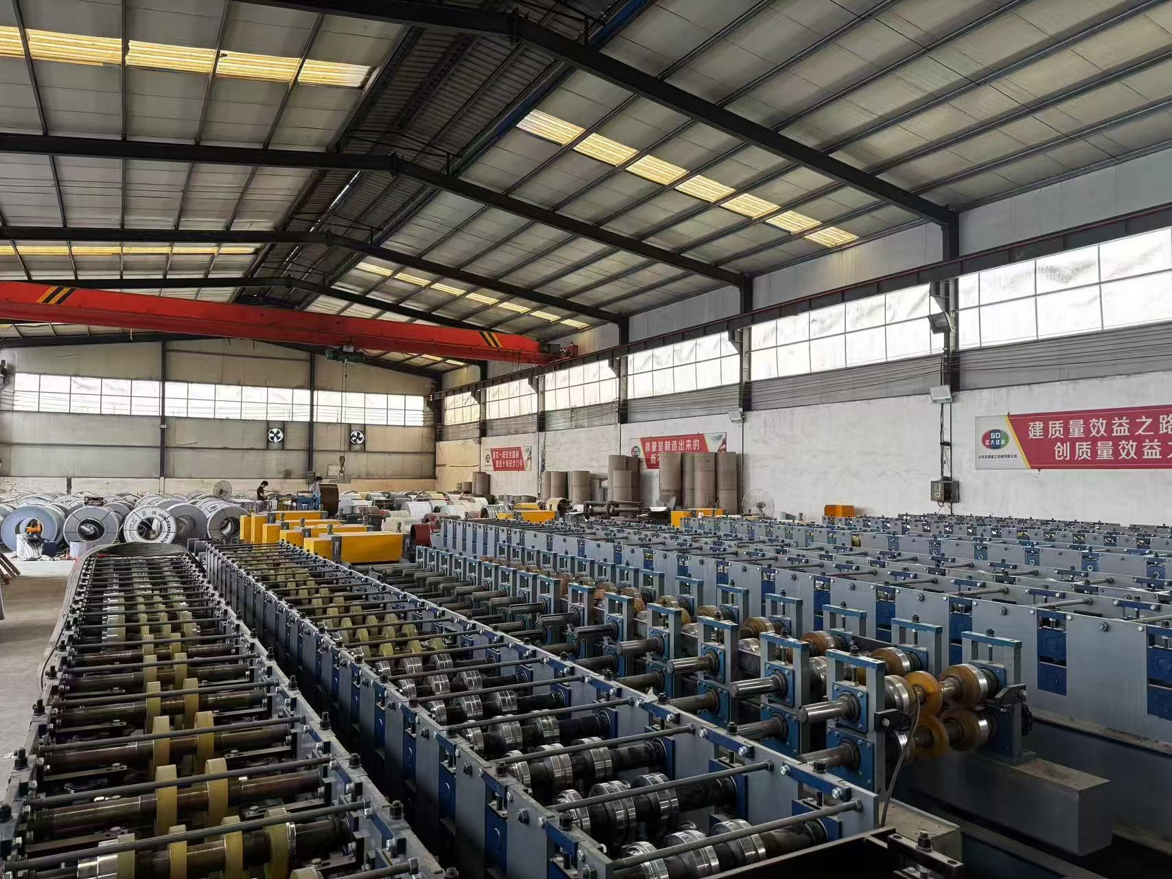 TopPeak wall panel production lines inside the factory workshop