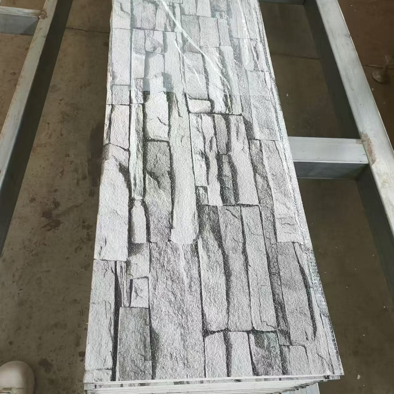 Gray stacked stone wall panel finish